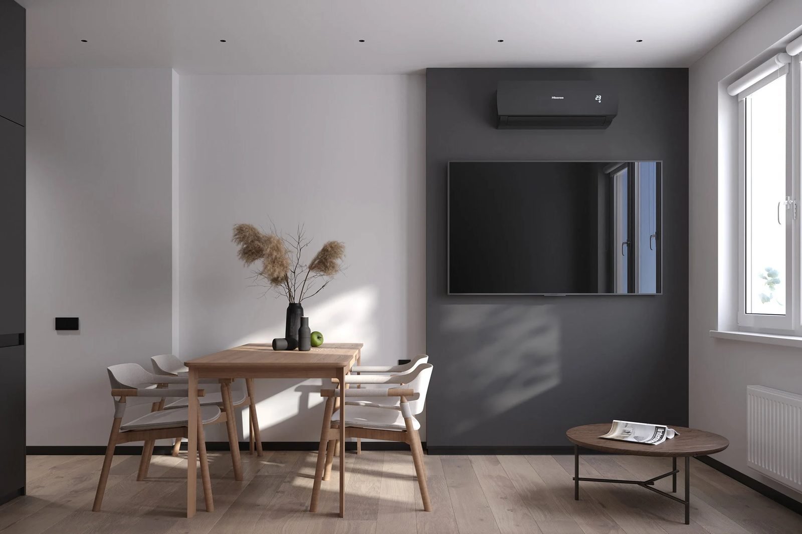 Dining area with an oak table, moulded chairs and a charcoal TV wall